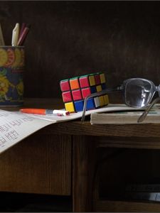 Preview wallpaper desk, glasses, instruction, rubiks cube