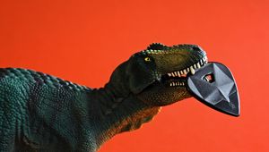 Preview wallpaper dinosaur, toy, pick