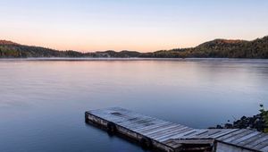 Preview wallpaper dock, lake, shore, flowers, sunset, nature