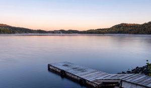 Preview wallpaper dock, lake, shore, flowers, sunset, nature