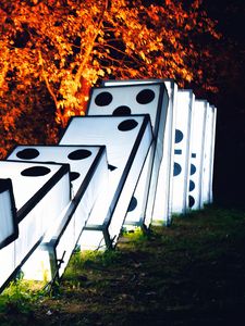 Preview wallpaper dominoes, figures, glow, tree, night