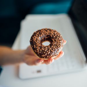 Preview wallpaper donut, chocolate, dessert, hand, blur