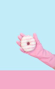 Preview wallpaper donut, hand, glove, minimalism