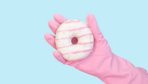 Preview wallpaper donut, hand, glove, minimalism