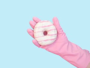 Preview wallpaper donut, hand, glove, minimalism