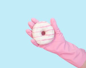 Preview wallpaper donut, hand, glove, minimalism