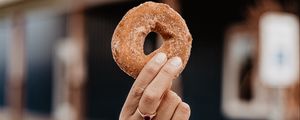 Preview wallpaper donut, pastry, hand, ring, focus