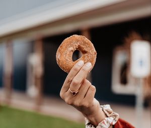 Preview wallpaper donut, pastry, hand, ring, focus