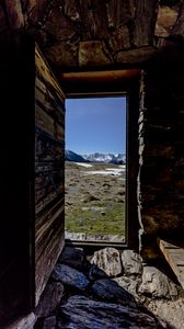 Preview wallpaper door, stones, grass, mountains, nature