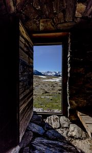 Preview wallpaper door, stones, grass, mountains, nature