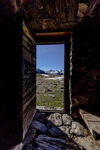 Preview wallpaper door, stones, grass, mountains, nature