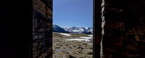 Preview wallpaper door, stones, grass, mountains, nature