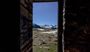 Preview wallpaper door, stones, grass, mountains, nature