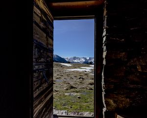 Preview wallpaper door, stones, grass, mountains, nature