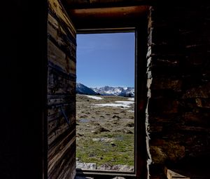 Preview wallpaper door, stones, grass, mountains, nature