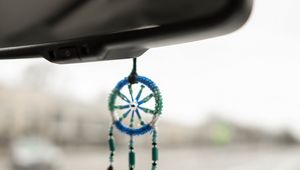 Preview wallpaper dreamcatcher, mascot, mirror, car, map