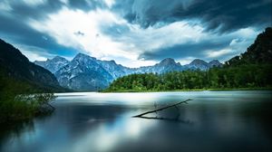 Preview wallpaper driftwood, lake, mountains, sky, clouds