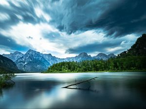 Preview wallpaper driftwood, lake, mountains, sky, clouds