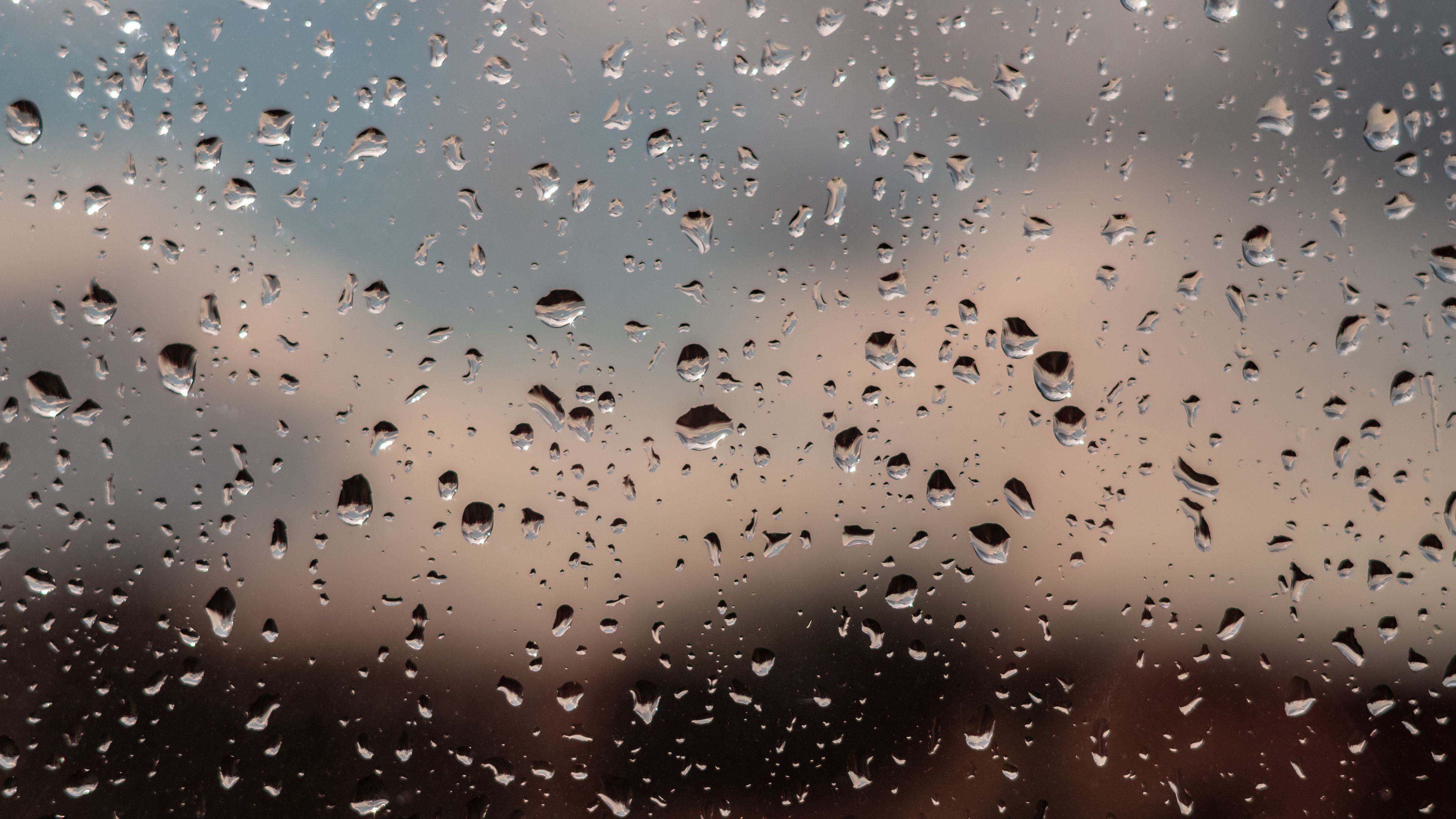 Download wallpaper 3840x2160 drops, glass, rain, window, moisture, blur 4k  uhd 16:9 hd background