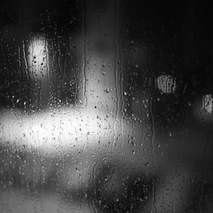 Preview wallpaper drops, rain, glass, blur, black and white