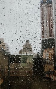 Preview wallpaper drops, rain, window, city, glass