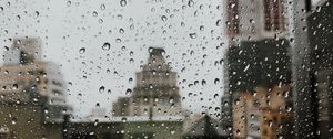 Preview wallpaper drops, rain, window, city, glass