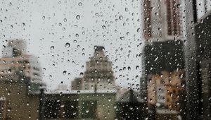 Preview wallpaper drops, rain, window, city, glass