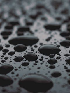 240x320 Wallpaper drops, surface, close-up, black