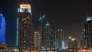 Preview wallpaper dubai, skyscrapers, boats, pier