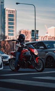Preview wallpaper ducati, motorcycle, red, motorcyclist, road, cars