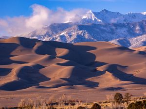 Preview wallpaper dunes, sand, mountains, snow, clouds, nature