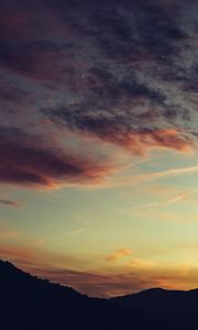 Preview wallpaper dusk, dark, clouds, mountains, outlines