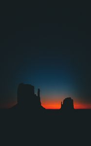 Preview wallpaper dusk, dark, rocks, outlines, sunset