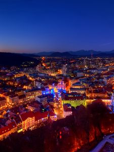 Preview wallpaper dusk, evening, lights, home, castle, mountains, alps, christmas, slovenia