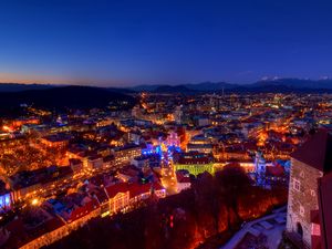 Preview wallpaper dusk, evening, lights, home, castle, mountains, alps, christmas, slovenia