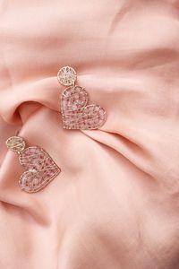 Preview wallpaper earrings, hearts, decoration, fabric, folds, pink