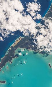 Preview wallpaper earth, planet, clouds, sea, island, view from space