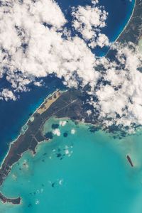 Preview wallpaper earth, planet, clouds, sea, island, view from space