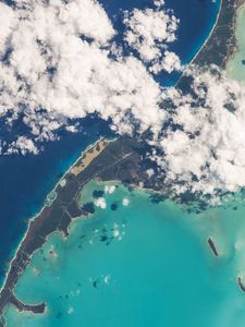 Preview wallpaper earth, planet, clouds, sea, island, view from space