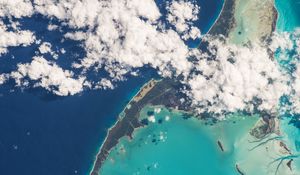 Preview wallpaper earth, planet, clouds, sea, island, view from space