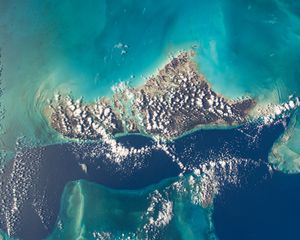 Preview wallpaper earth, planet, island, sea, clouds, view from space, space