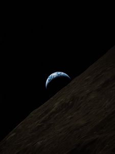 Preview wallpaper earth, planet, moon, surface, space, dark