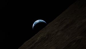 Preview wallpaper earth, planet, moon, surface, space, dark