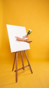 Preview wallpaper easel, canvas, hands, flowers, illusion, installation