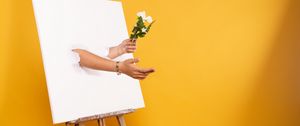 Preview wallpaper easel, canvas, hands, flowers, illusion, installation