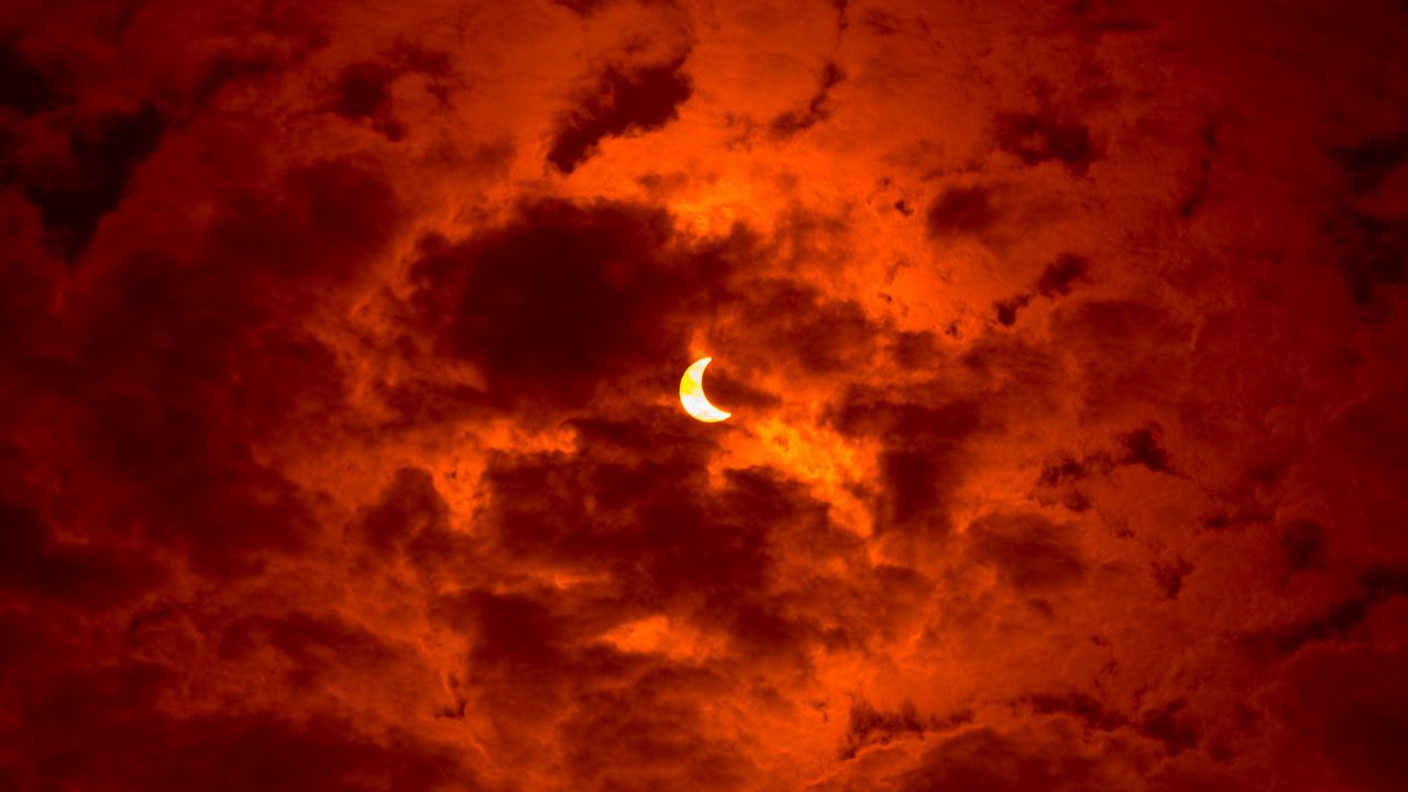 Wallpaper eclipse, moon, sun, sky, orange