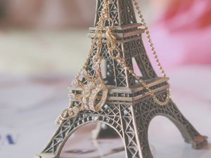 Preview wallpaper eiffel tower, chains, jewelry