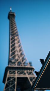 Preview wallpaper eiffel tower, pigeons, roof, blur