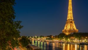 Preview wallpaper eiffel tower, tower, river, road, long exposure