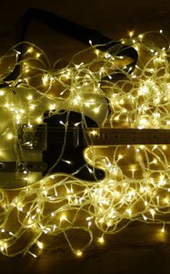 Preview wallpaper electric guitar, guitar, music, garland, glow